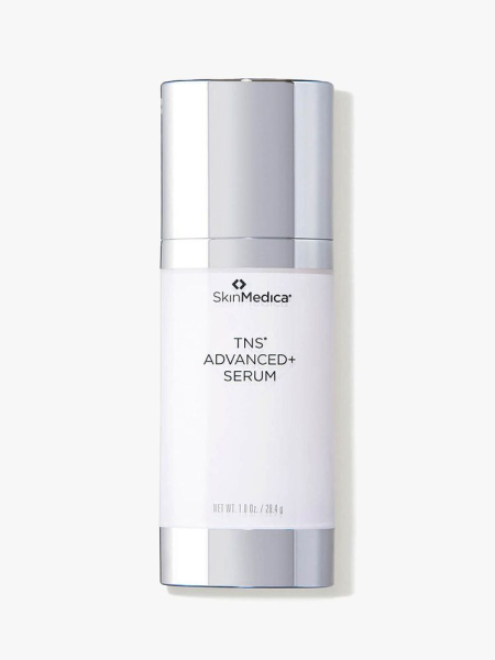 SkinMedica TNS Advanced+ Serum in white and silver bottle on light grey background